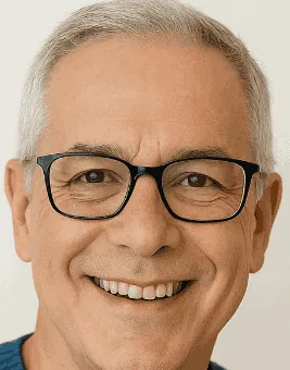 Testimonial photo: David R., 52, smiling while wearing black glasses.- review 1